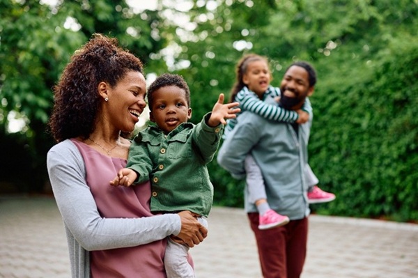 Happy family walking together.