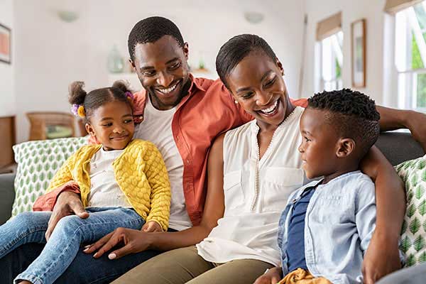 African American family on sofa