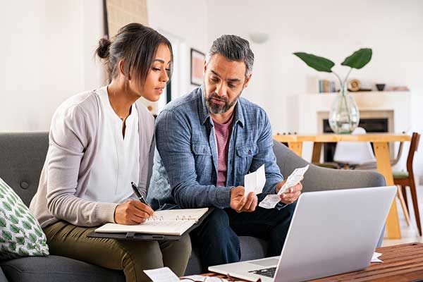 Educator with agent looking at retirement options