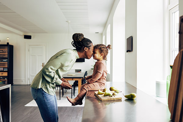 Mother and toddler in kitchen