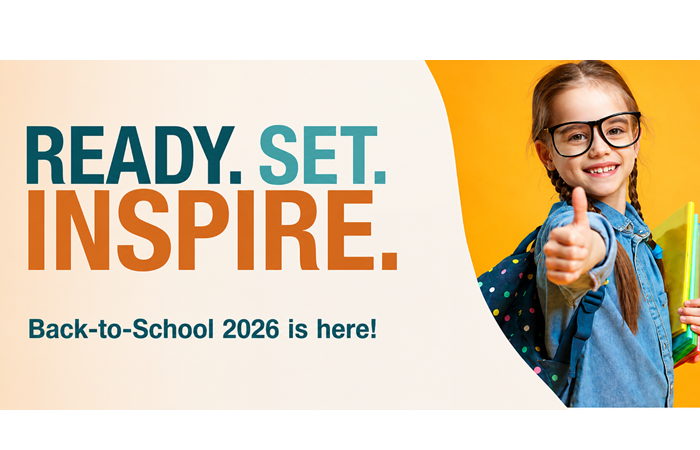 Promotional banner with the headline "READY. SET. INSPIRE." in large teal and orange text above the message "Back-to-School 2026 is here!" On the right, a smiling school-age child wearing oversized black glasses, a denim shirt, and a colorful backpack gives a thumbs-up while holding notebooks against a bright yellow background. The left side features a clean white background with curved design elements that draw attention to the text.