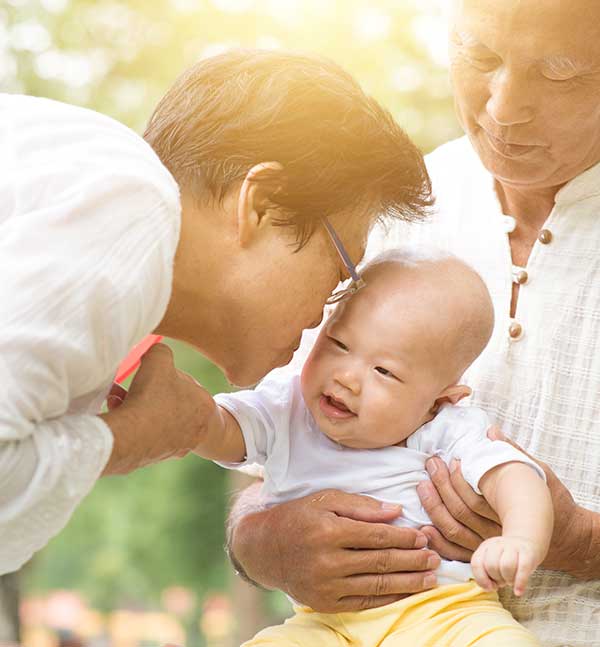 Asian couple with grandbaby