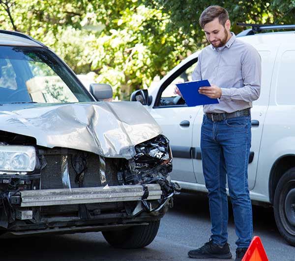 Agent in the field at a car accident