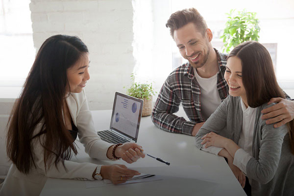 Asian American agent with couple clients