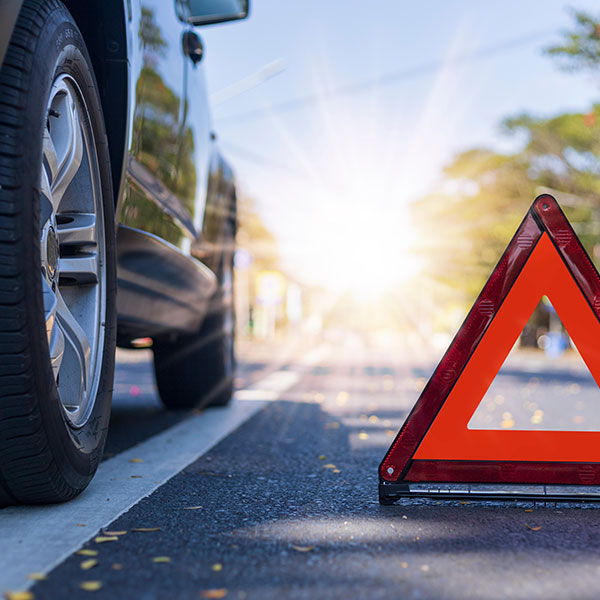 Car with emergency triangle