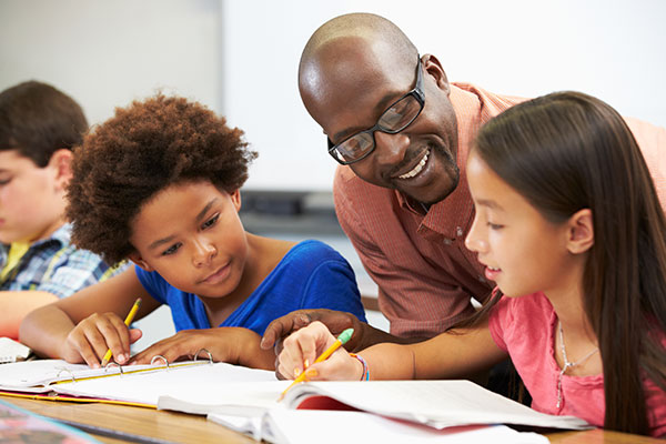 Teacher working with a group of students